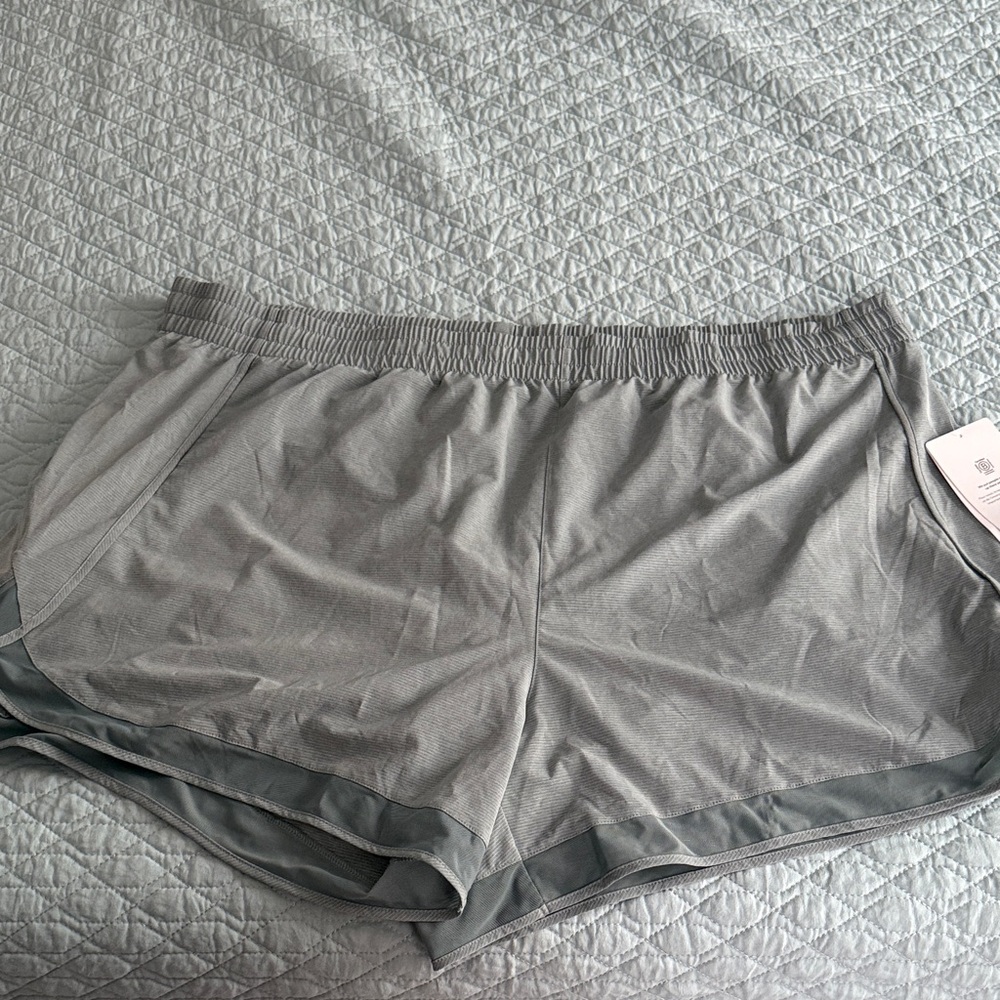 4” Athleta Sage green mesh racer run shorts